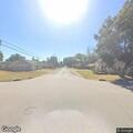 Paint spilled on roadway at Grigsby and Wilson