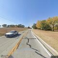 Man walking in middle of road on Coon Creek Road
