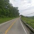 Tree hanging over road causes hazard on State Route 342