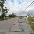 Injured dog in roadway after vehicle strike