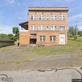 Suspicious person walking toward Mulberry Street