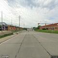 Car drag racing near West 130th and Enterprise