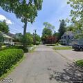Person’s hand stuck in door on Cowles Avenue