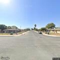 Suspicious man in small black car on Francis Drive