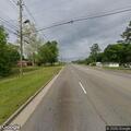Person with back pain on Powder Springs Road