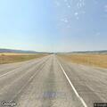 Truck reported weaving over center line on highway