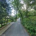 Driver injures hand after car hits tree