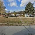 Unregistered truck parked in roadway on E Eldora Ave