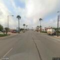Blue semi weaving through traffic on Texas Boulevard