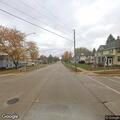 Vehicle stopped with flashers at intersection