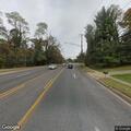 Car leaves road and enters wooded area