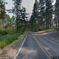 Vehicle rolls down embankment off Territorial Highway