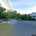 Loose water cover creating road hazard