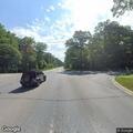 Vehicle in ditch near Powder Mill Road