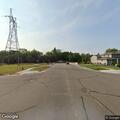Loose miniature dog reported near North Third