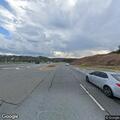 Person with altered consciousness pacing on roadway