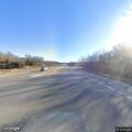 Vehicle in ditch on ramp from MO-152 to I-435