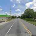 Tree debris partially blocking Old Roop Road