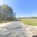 Large brush fire near homes on Holly Swamp Church Rd