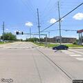 Person experiencing chest pain at gas station