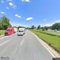 Disabled Mazda and debris reported on I-26