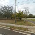 Person with headache at Allura Palm Harbor