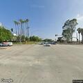 Person sleeping on street at Del Amo and Prairie Ave