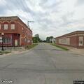 Vehicle hits road hazard on South Broadway