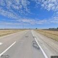 Semi truck swerving across lanes on Highway 34