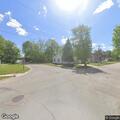 Female found lying motionless in road median at Elmwood Plaza