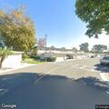 Disabled vehicle with detached tire on Baker Street