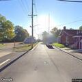 Vehicle and tractor crash blocks lane on North 10th