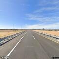 Pregnant woman walking on I-40 near Erick
