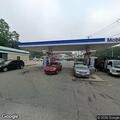 Person with abdominal pain at Mobil gas station