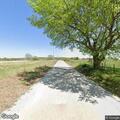 Grass fire threatening home and chicken coop