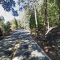Large boulder blocking lane on North Road