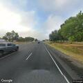 Person reported with abdominal pain on highway near Bullard