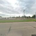 Erratic flatbed pickup driving through Larned