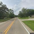 Woman with head injury and breathing problems near lodge