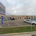 Person threatening suicide in vehicle behind business