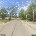 Officer broadcast on white Chevy Traverse
