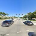Man slumped over wheel in car at intersection in Homestead