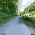 Road closed for tree and power lines on Fire Line
