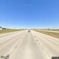 Person unconscious in silver SUV on highway exit ramp