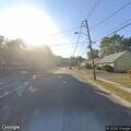 Officer conducts traffic stop on white Lexus SUV
