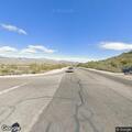 Car doing donuts in roadway at East Catalina Highway