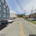 Woman reports item taken and minor injuries