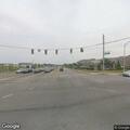 Officer assists stopped driver at busy intersection