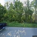 Vehicle at risk of falling down embankment