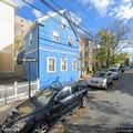 Vehicle parked on sidewalk in Somerville